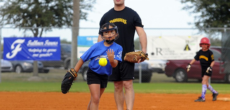 Valeria Pankey got the call on the mound for the 8U Falkner Farms team.