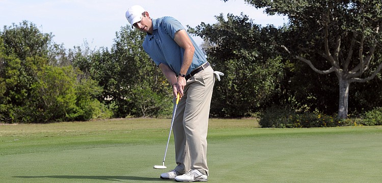 Professional golfer Abbie Valentine brushed up on his putting before teeing off.