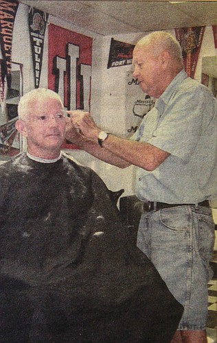 Larry Lantz served as a barber on Siesta Key for 48 years. He spent the last 12 years of his career at The Village Barber, in Siesta Center. File photo.