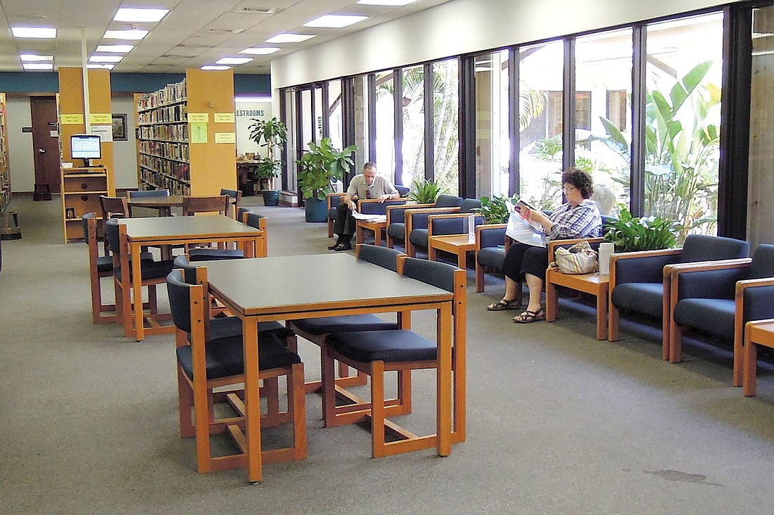 The central atrium reading area of Gulf Gate Library is so popular, patrons have asked staff for a similar space in the new facility.