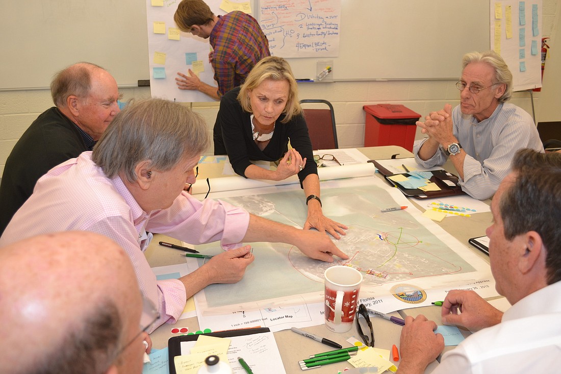 Participants began a January workshop by sharing thoughts and ideas for the north end in small groups.
