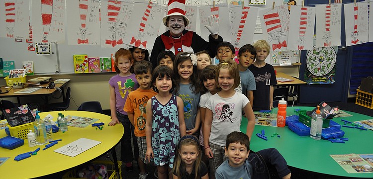 Fruitville Elementary teacher Laurie Butler dressed as The Cat in the Hat to celebrate Dr. Seuss' birthday.