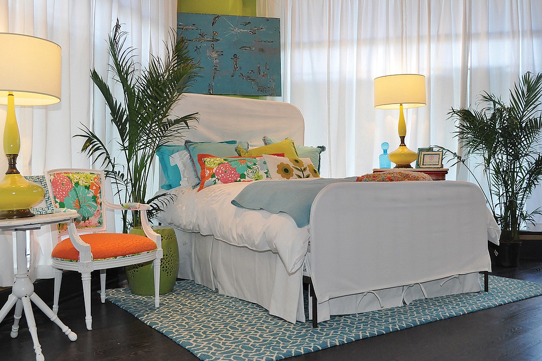 Bright and colorful Lilly Pulitzer fabrics give the master suite a Caribbean feel.