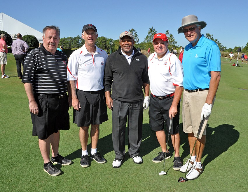 Bob Kessler, Clay Graham, Larry Wade and Bob Thompson, pictured with two-time Heisman trophy winner Archie Griffin, center, all hail from Zanesville, Ohio.