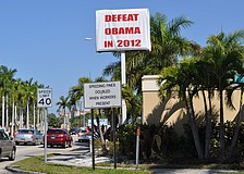 About 60,000 drivers will pass the sign every day.