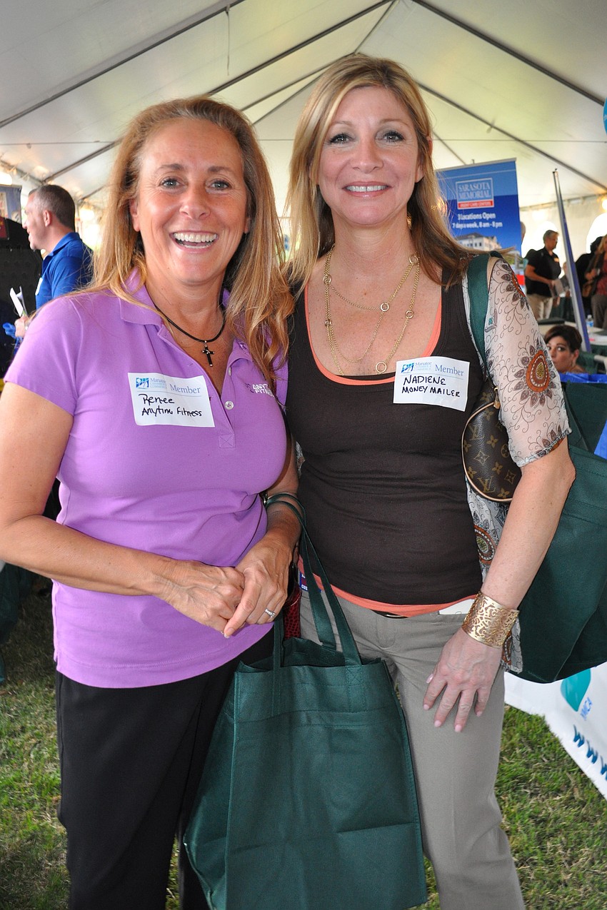 Renee Butz, of Anytime Fitness, with Nadiene Raia, of Money Mailer Direct Marketing