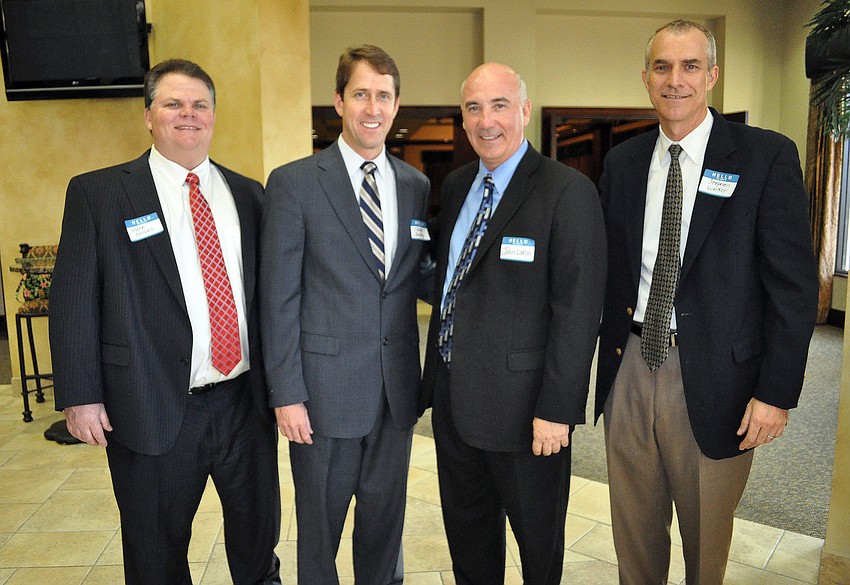 Attornies Mark Nelson, Morgan Bentley and Stephen Walker came out to show their support for Circuit Judge, 12th Judicial Circuit candidate John Lakin, second from right.