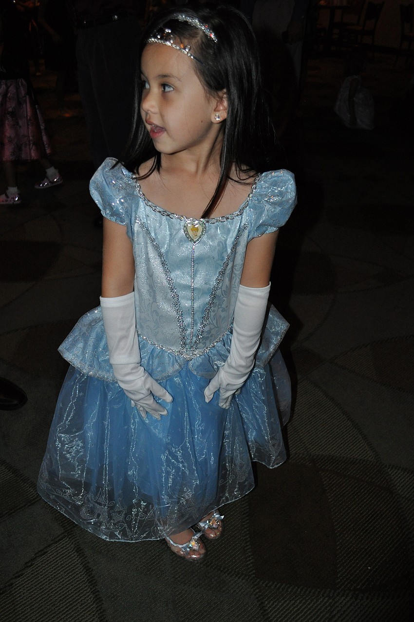 Selena Sanchez, 5, looked to her dad, Joe, for help learning the 