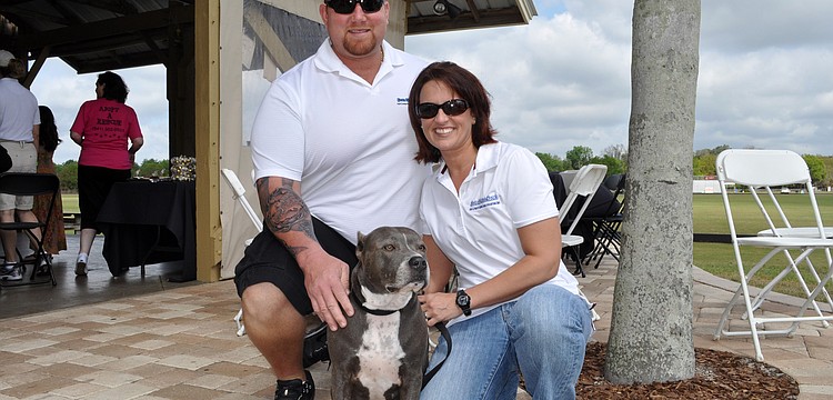 Sean McCutcheon and Jennifer Houghtaling and Sweetie the pit bull enjoyed the event.