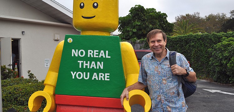 Dr. Leatherman poses with the Lego man, who made a surprise appearance at St. Boniface.