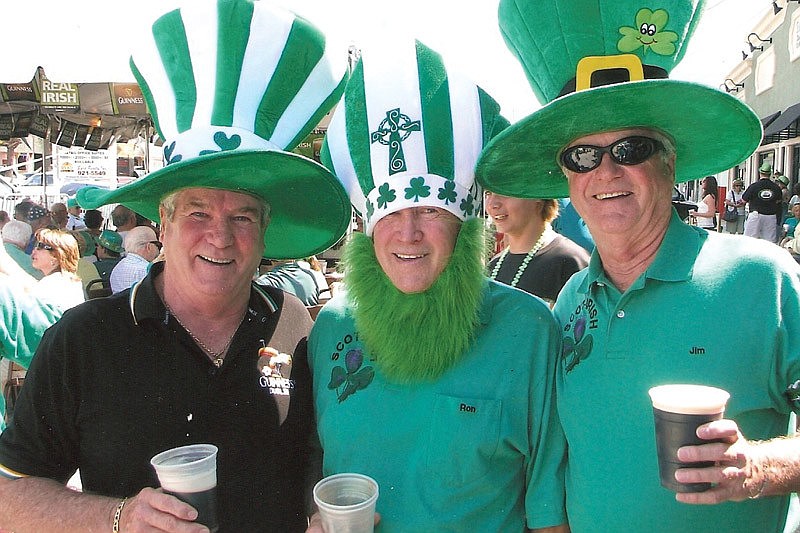 Revelers enjoy a past St. PatrickÃ¢â‚¬â„¢s Day gathering at the Irish Rover in Gulf Gate. The pub closed in August 2011. File photo.
