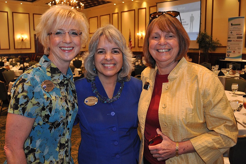 Terri Ayers and Marie Avery, of RE/Max Alliance Group, with Vicki Vega, of the Sarasota Chamber of Commerce