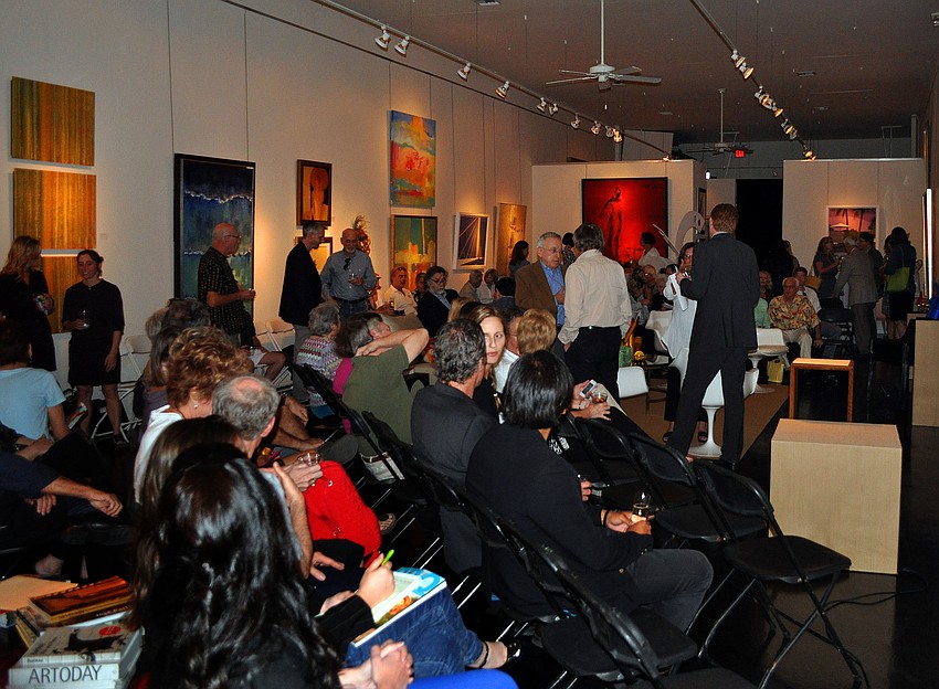 A large crowd filed into the State of the Arts Gallery, Thursday, March 15 for the 10x10 event.