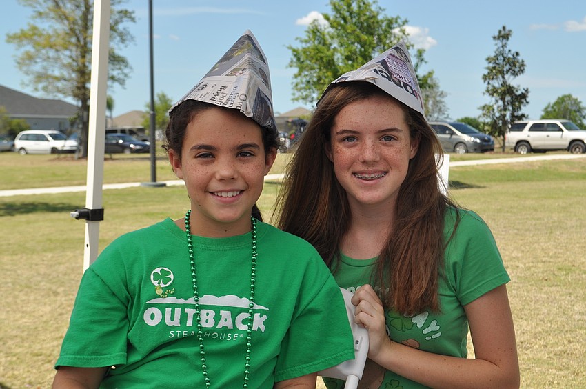 Charlie and Katie Ruth made hats out of the Observer