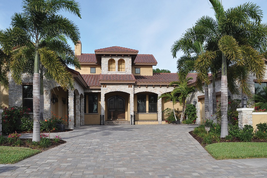 Country Club of Lakewood Ranch home, which has four bedrooms, four-and-one-half baths, a pool and 4,402 square feet of living area, sold for for $1,085,000. Photo by Jen Blanco.
