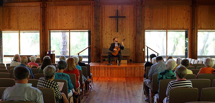 Dr. Zachary Johnson played on the small stage inside Siesta Key Chapel, Sunday, March 25, as part of the Arts Series.