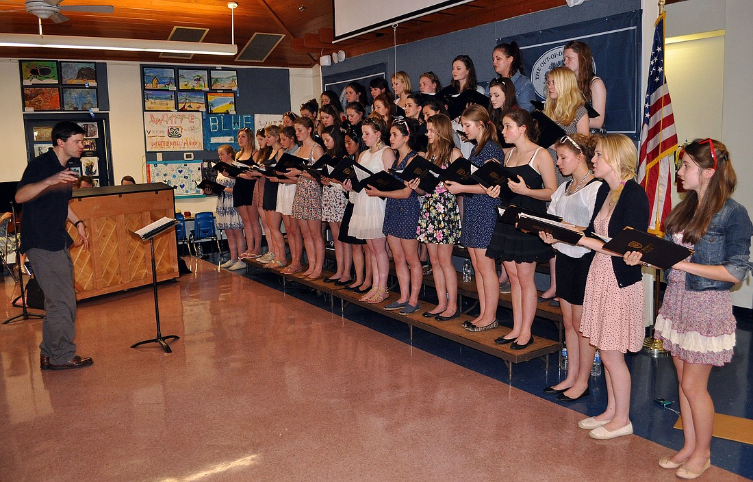 Edward Whiting directs St. MaryÃ¢â‚¬â„¢s School CalneÃ¢â‚¬â„¢s chamber choir, Monday, March 26, inside the cafeteria at Out-of-Door Academy.