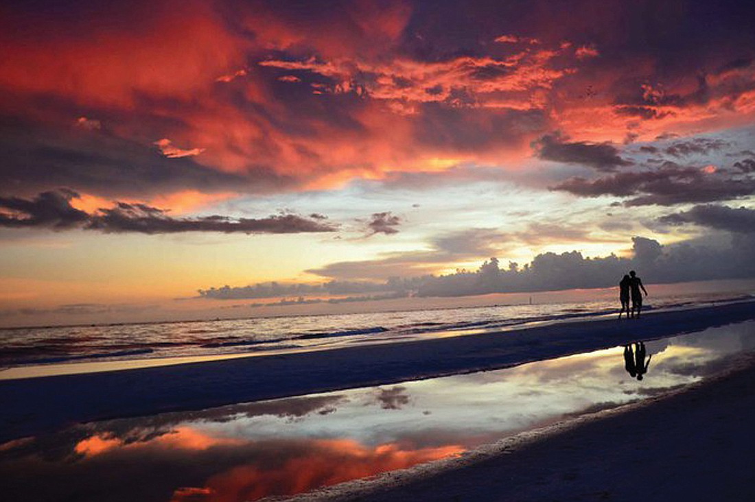 Pamela Wall submitted this photo, taken at Siesta Key Beach Access 5 the night her husband proposed.