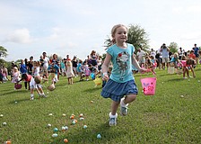 It only took the kids a few minutes to snatch up thousands of Easter eggs.