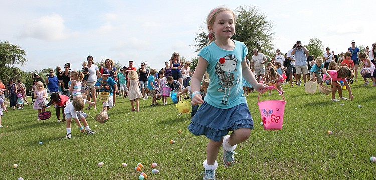 It only took the kids a few minutes to snatch up thousands of Easter eggs.