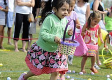 Four-year-old Luciana Aguilar took off running as soon as her age group was allowed to collect its eggs.