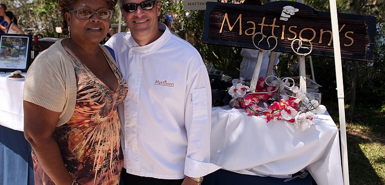 Aundria Castleberry, Director of Development at All Faiths Food Bank, and Paul Mattison, Co-chair