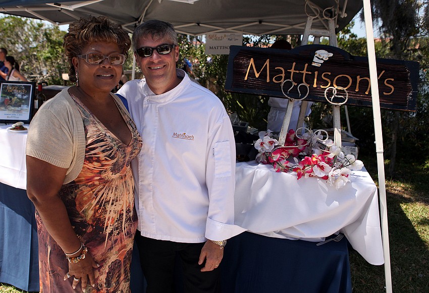 Aundria Castleberry, Director of Development at All Faiths Food Bank, and Paul Mattison, Co-chair