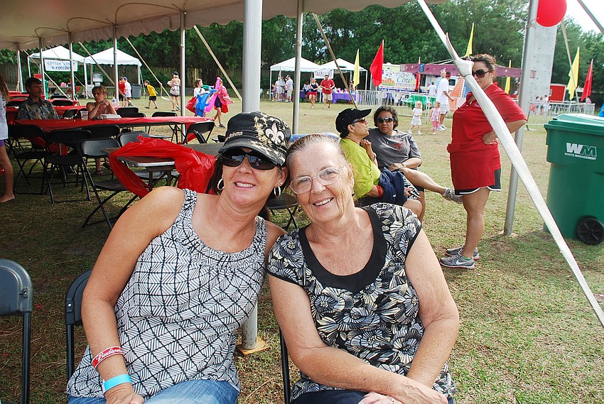 Pam Dupont and Jean Schexnaydre enjoyed listening to the Cajun Boogie Band