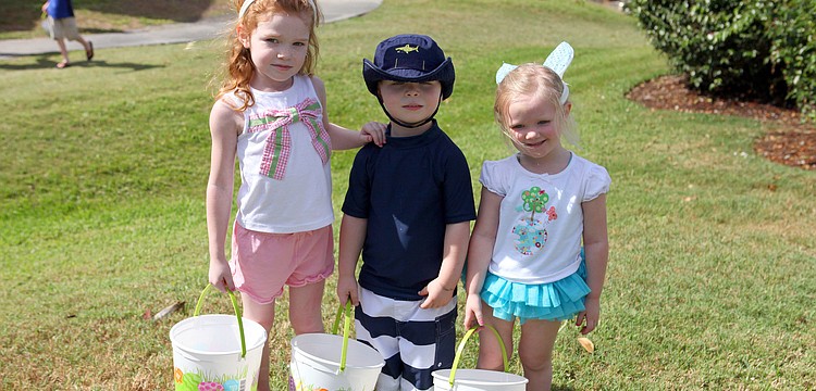 Suzanne MacMichael, 5, Brennan Carmichael, 3, and Meghan MacMichael, 3