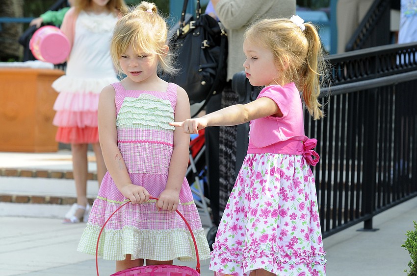 Best friends Ella Bonner and Sophia Paterson, both 4, strategized before the start of the Easter Egg Hunt.