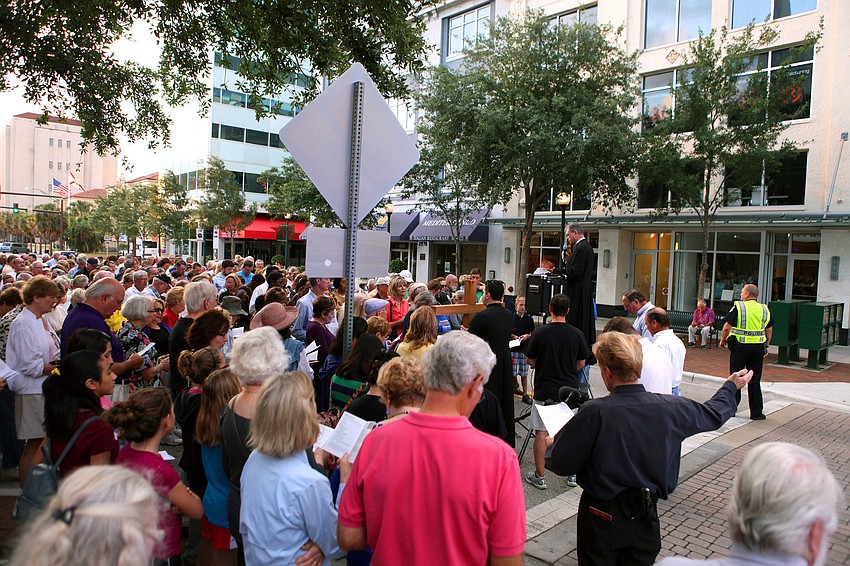 A large crowd came out for the Church of the Redeemerâ€™s 16th Annual Good Friday Stations of the Cross walk, Friday, April 6, down Main Street.