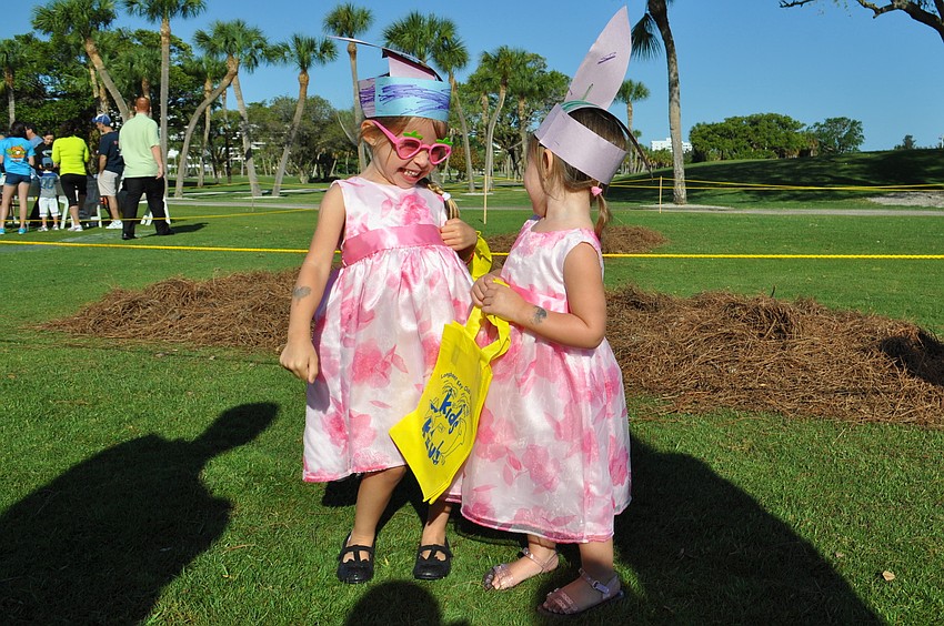 Samantha and Abby DiPinto have fun in their matching Easter dresses