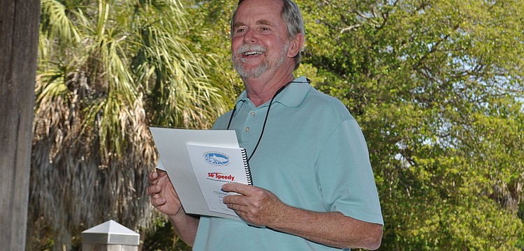 Rusty Chinnis thanks the garden club for the $1,500 grant they gave to Sarasota Bay Watch, which will benefit Sister Keys area