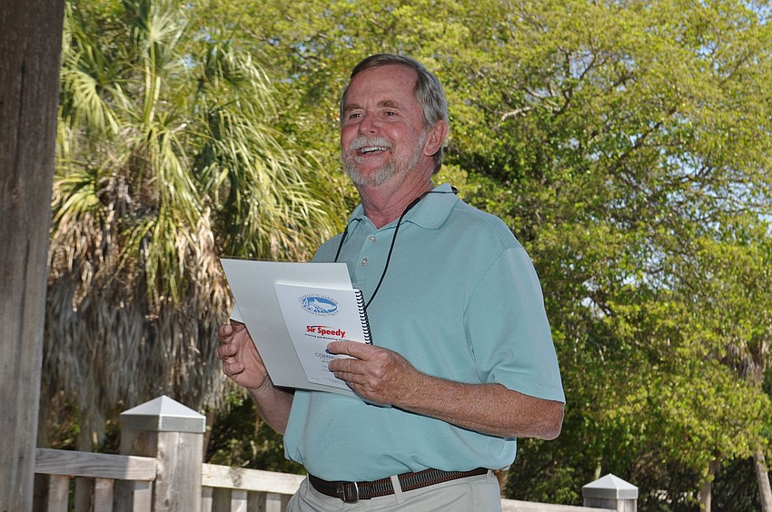 Rusty Chinnis thanks the garden club for the $1,500 grant they gave to Sarasota Bay Watch, which will benefit Sister Keys area