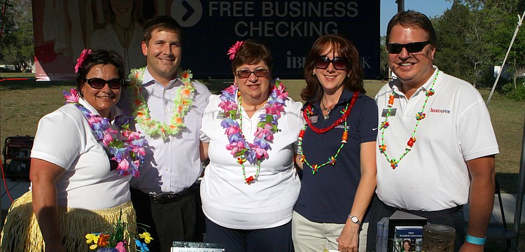 Kathleen White, John Texada, Linda Stewart, Darcy Lawn and Mike Beitzinger of Iberia Bank