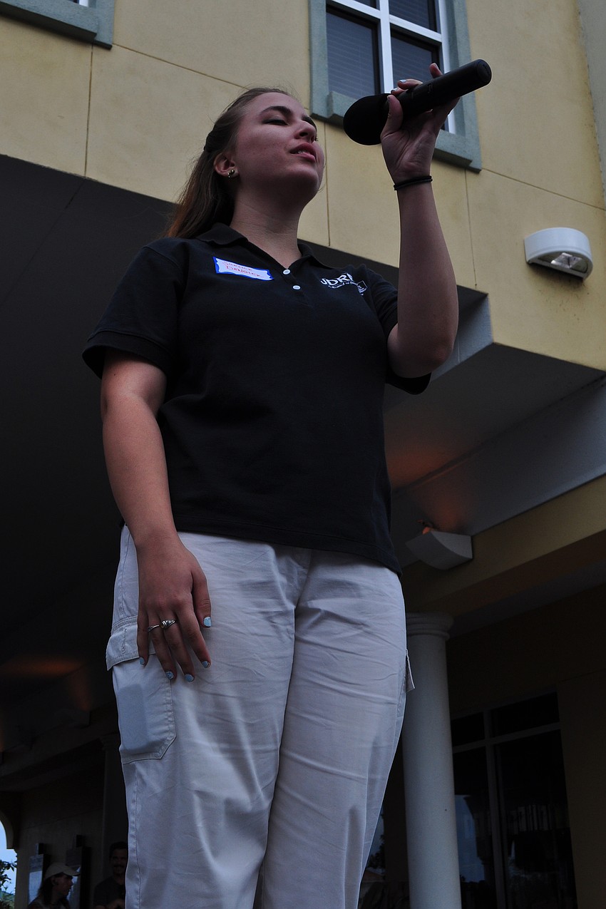 Silence Dengler sang the national anthem.