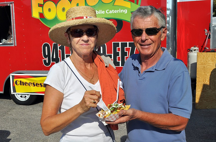 Rhonda Dix and Bill Norris share the Loaded Works mac and cheese.