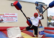 Douglas Jennings, chef at SKOB, goes down after being jousted off his post by Evan Fernandez.