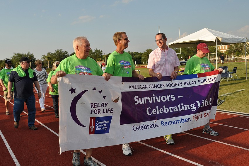 Cancer survivors walked the first lap.