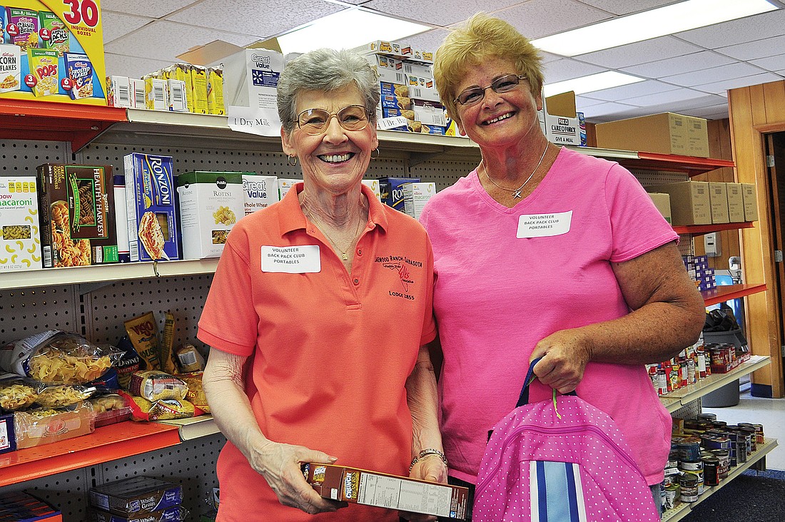 Volunteers Mary Bilkie and Barb Grundy said they look forward to packing the backpacks for the children and make sure to schedule their other activities around it.