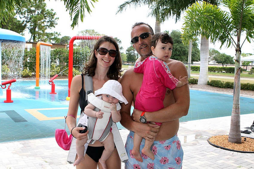 Audrey and Chris Vandewiele have fun at Healthy Kids Day with their daughters Eleanor, 4 mos., and Andrea, 23 mos.