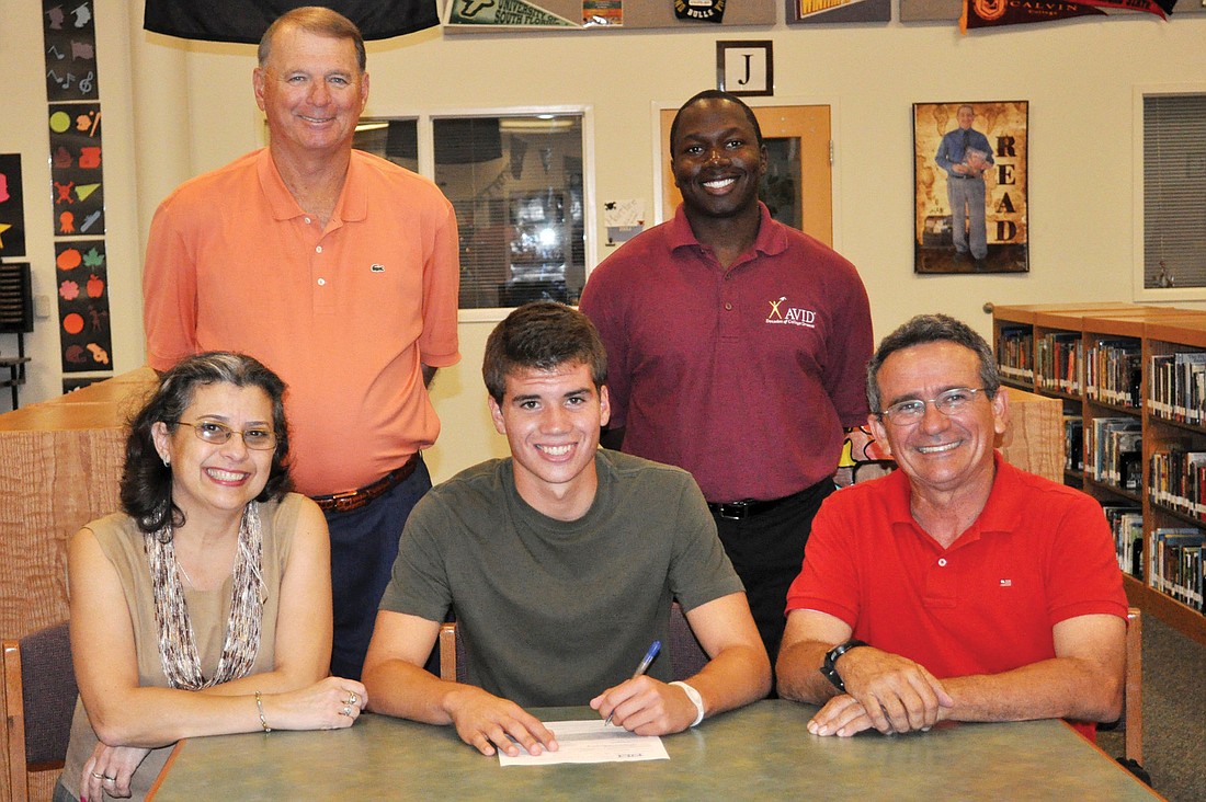 Braden RiverÃ¢â‚¬â„¢s Ivo Lima, center, will play soccer at Jacksonville University. He also plans to major in business management. Photo by Jen Blanco.