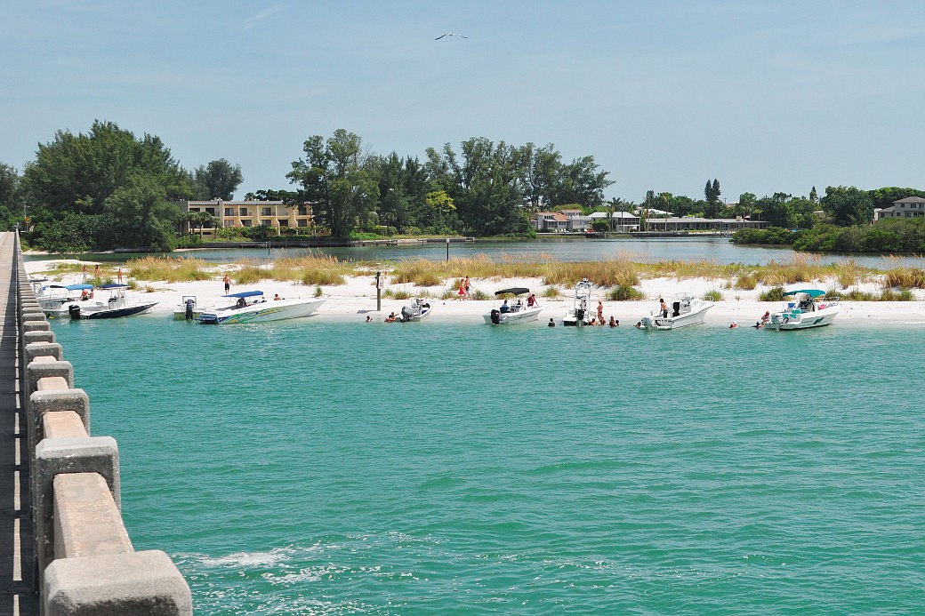 The Longboat Pass Inlet Management Plan calls for installing a terminal groin at Beer Can Island, pictured, and two groins on northern Longboat Key to control Longboat Pass erosion. File photo.