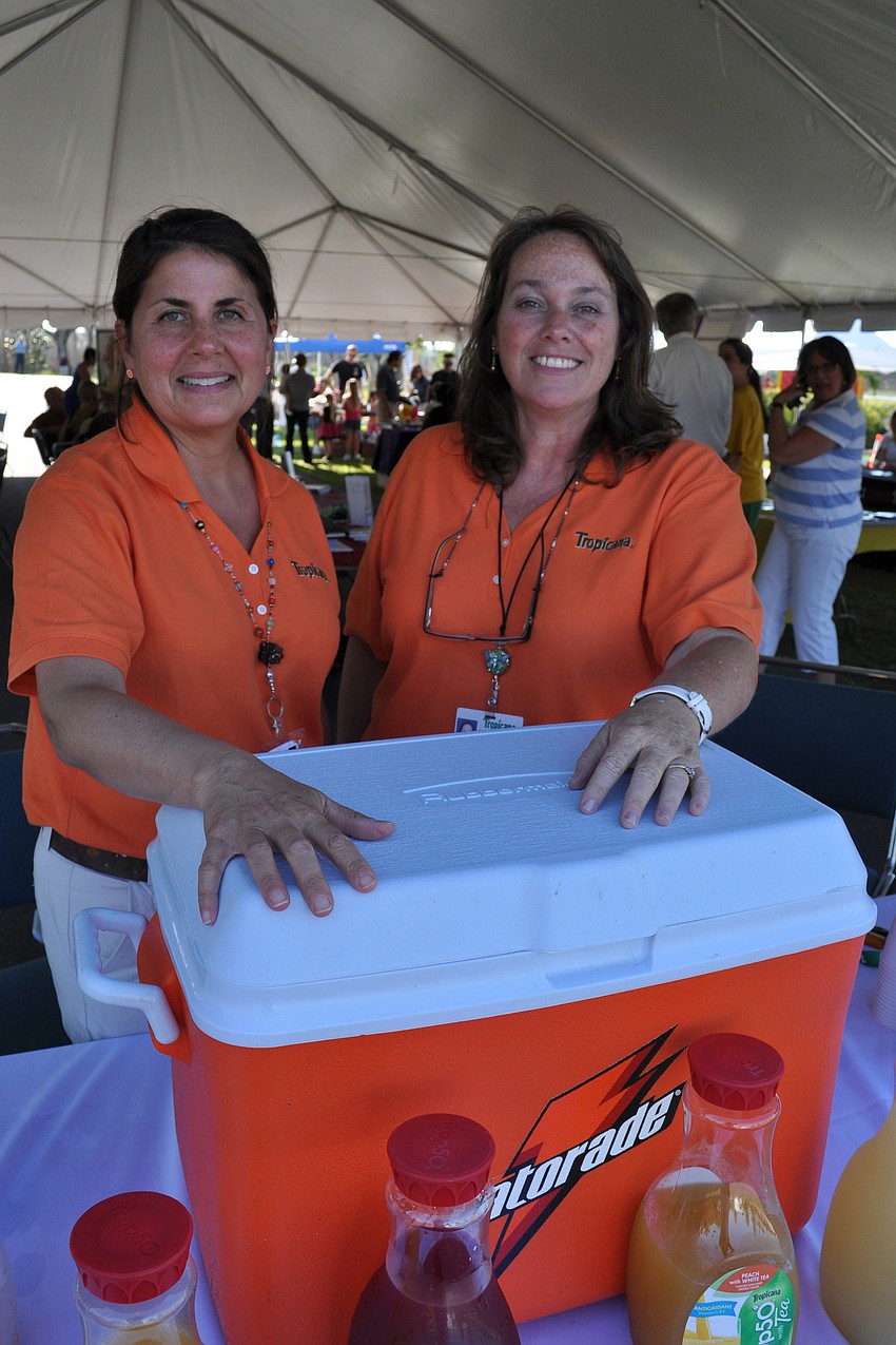 Tracy Szelwach and Cindy Kalligher gave out samples from Tropicana.