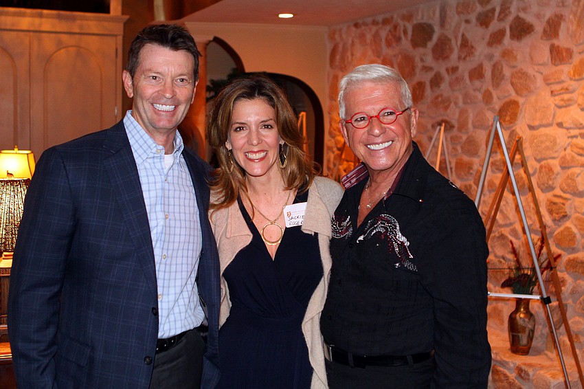 Angus and Jackie Rogers pose with Bob Trisolini