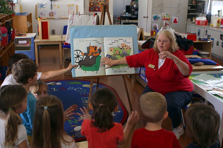 Nancy Velazquez, a librarian at Gulf Gate Library, reads 