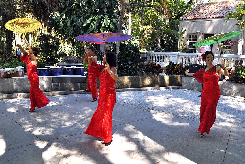 Members of the Gulf Coast Chinese American Association performed a parasol dance, Saturday, March 17, during 7th Annual Asian Cultural Festival at Marie Selby Botanical Gardens.