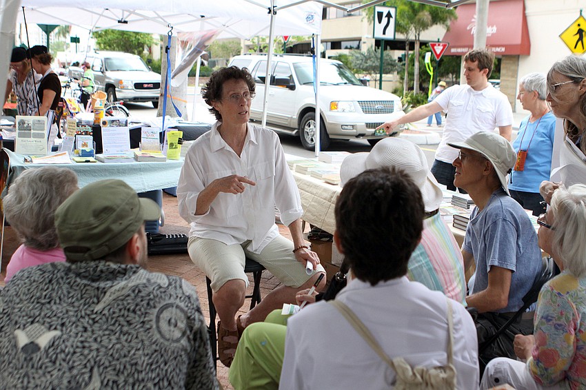 Lea Hall talks to a group about permaculture, Saturday, April 14, at EcoFest.