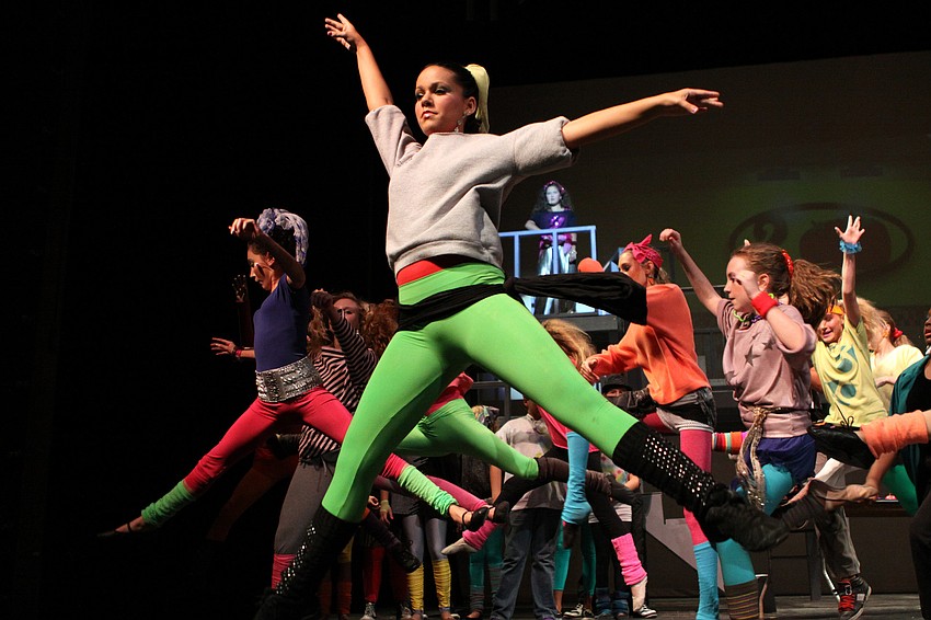 Jessica Polimeni, 8th grade, and the rest of the dance class leap into the air.