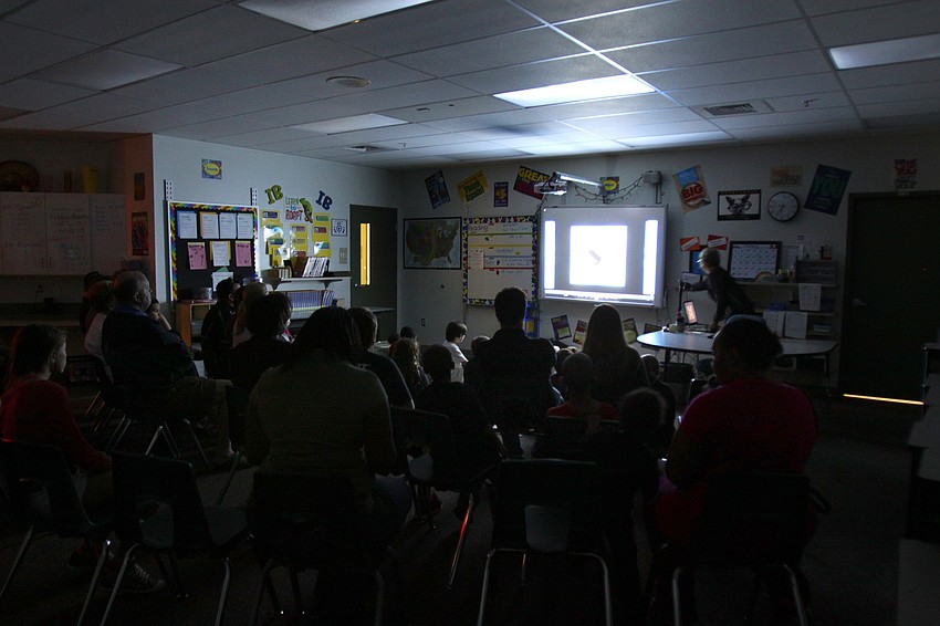 Students, parents and family members watch some of the documentaries made by the 5th graders, Thursday, Jan. 12, during the 5th grade Documentary Film Fest at Phillippi Shore Elementary.